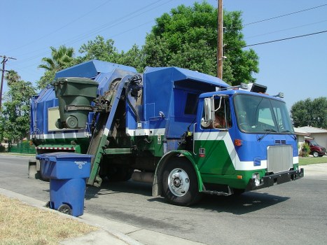 Business professionals discussing waste management strategies