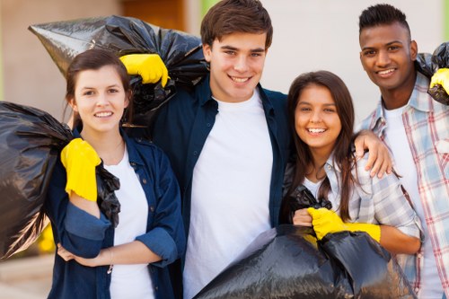 Professional rubbish clearance team at work