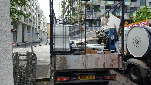 Professional team removing office furniture in Central London